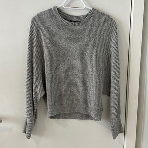 Long sleeved grey sweater